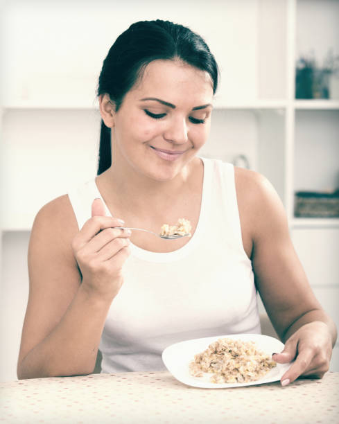 istock Young girl holding bowl 868876176