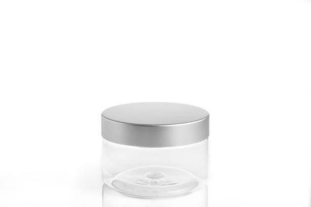istock empty plastic, glass jars cosmetic, lotion packaging on a white background 868877344
