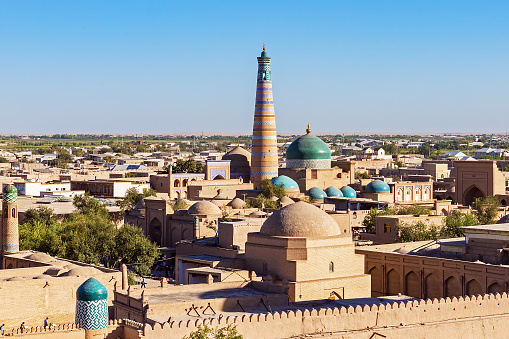 Panoramic view of Islam Khoja Minaret and moque in Itchan Kala, the inner town of the city of Khiva - Uzbekistan