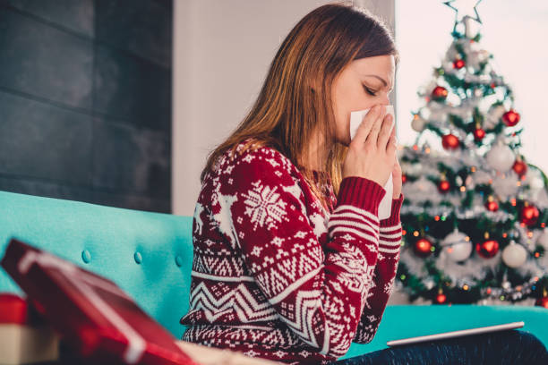 istock Women blowing her nose 868880750