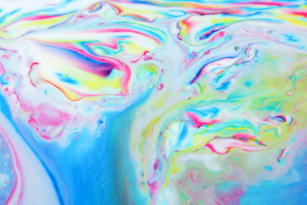 istock Image of an abstract dolphin painted on a liquid, abstract background, a creative background with a dolphin pattern, a multi-colored pattern with a dolphin symbol 868883438
