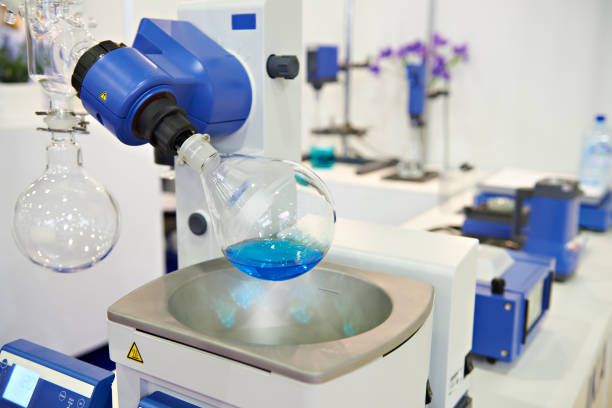 istock Laboratory rotary evaporator with chemical preparation in flask 868883998