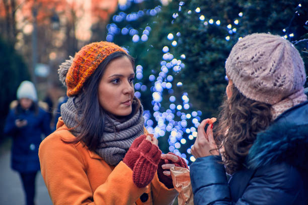 istock Enjoying Christmas Market 868884542