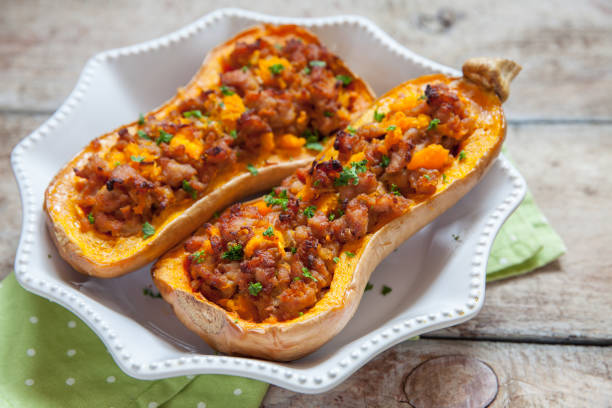istock Pumpkin stuffed with meat, vegetables and herbs 868887762