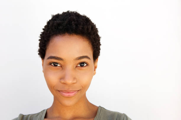 istock beautiful young black woman against white background 868887802