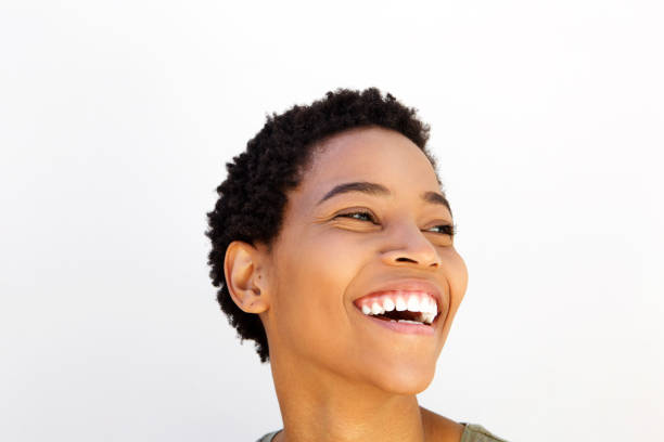 istock Close up beautiful young black woman laughing 868887994