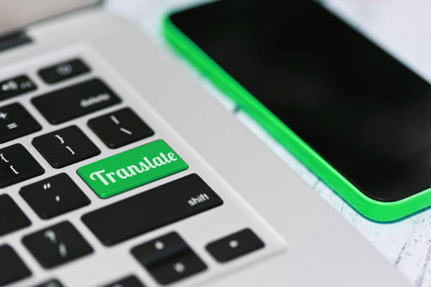 istock Online translating via laptop and smartphone 868891214
