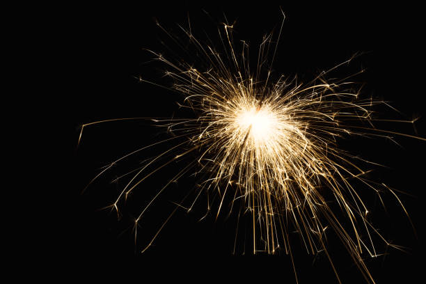 istock New year party sparkler closeup on black background 868896608