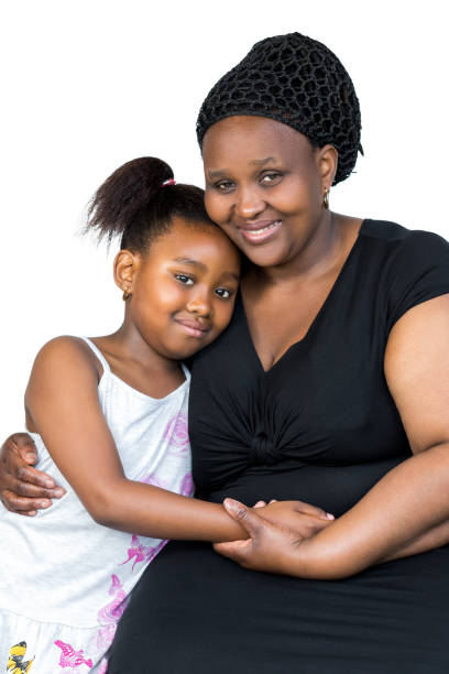 istock Little african kid resting on mother's shoulder. 868899864