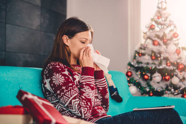 istock Women blowing her nose 868900190
