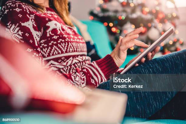 Women Using Tablet During Christmas Stock Photo - Download Image Now - Christmas, Online Shopping, Shopping