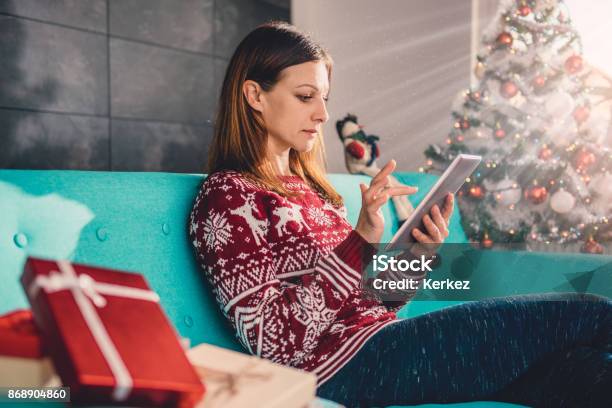 Women Using Tablet During Christmas Stock Photo - Download Image Now - Adult, Adults Only, Box - Container