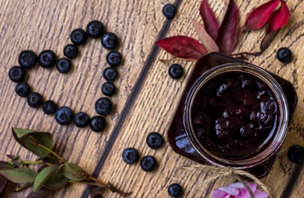 istock Blueberry jam; Blurred blueberries formed into a heart shape 868905050