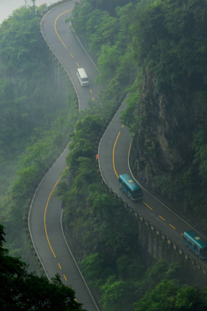 istock Curved Rock Mountain Road. Epic Mountain Landscape 868918660