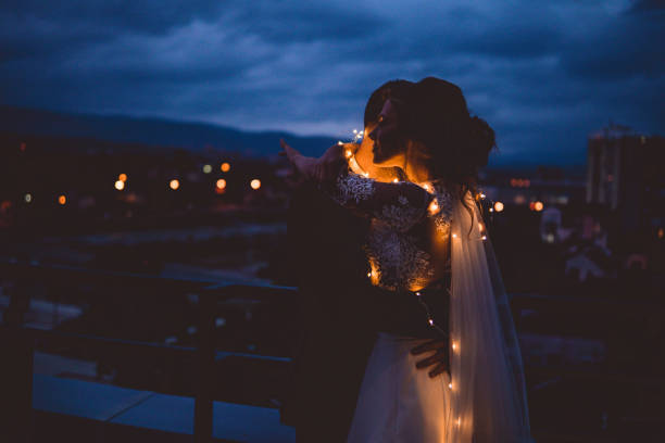 istock Romantic newlywed couple on the rooftop 868919182