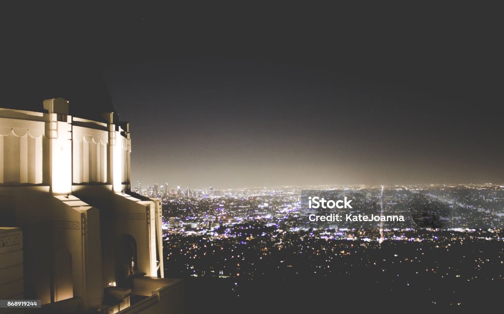 Griffith Observatory at night Griffith Observatory at night with a view of Financial District Griffith Park Observatory Stock Photo
