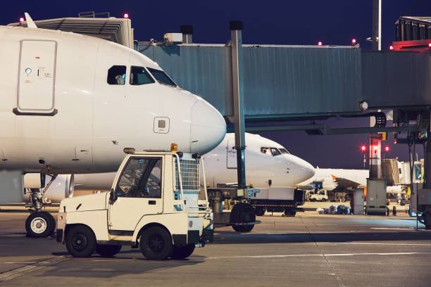 istock Busy airport at night 868923278