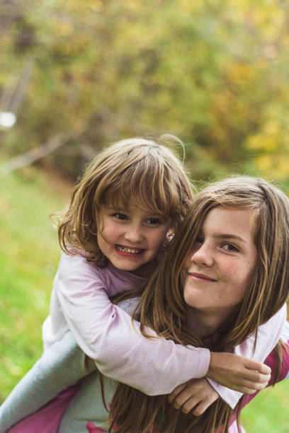 istock Young and joyful girls having fun together. 868923762