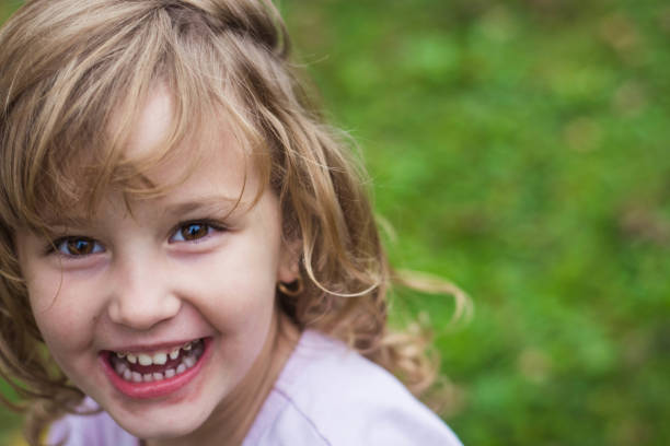 istock Happy young girl smiling. 868923802