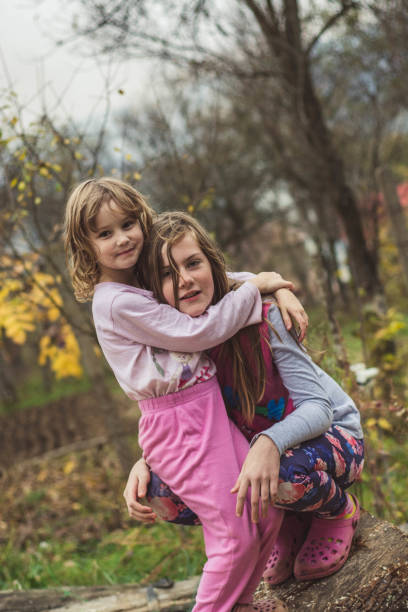 istock Young and joyful girls having fun together. 868923900