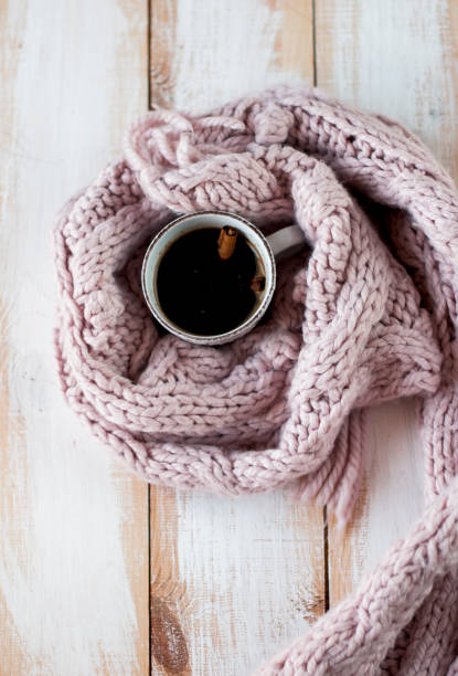 istock flat lay cup of coffee  framed by a knitted scarf 868924238