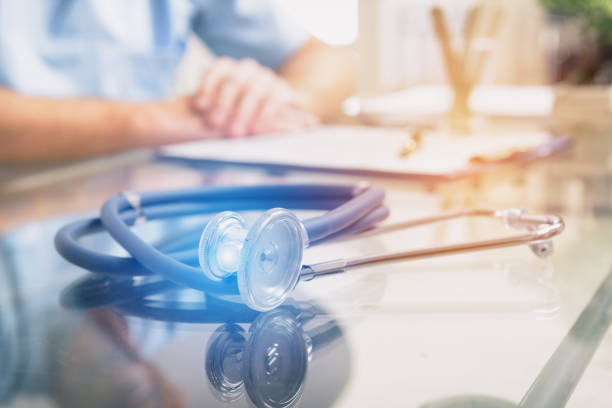 istock Close up of stethoscope and doctor 868926828