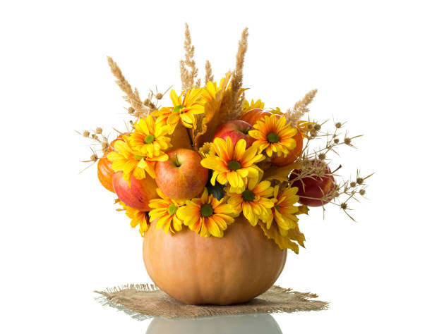 istock Fall bouquet in pumpkin isolated on a white 868927538