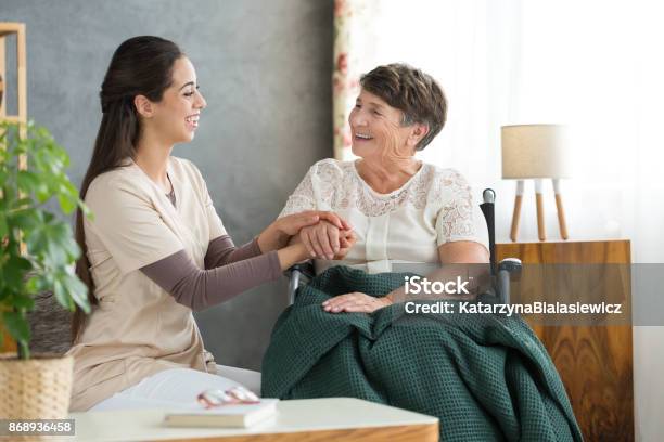 Smiling Woman And Happy Grandmother Stock Photo - Download Image Now - Parkinson's Disease, Home Caregiver, Assistant