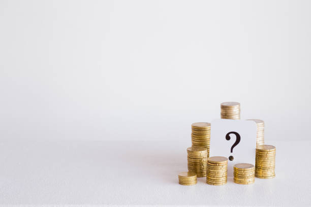 istock Question mark with coins stack on the gray background. Money offer concept. Mock up for different business ideas. Empty place for a text. 868937466