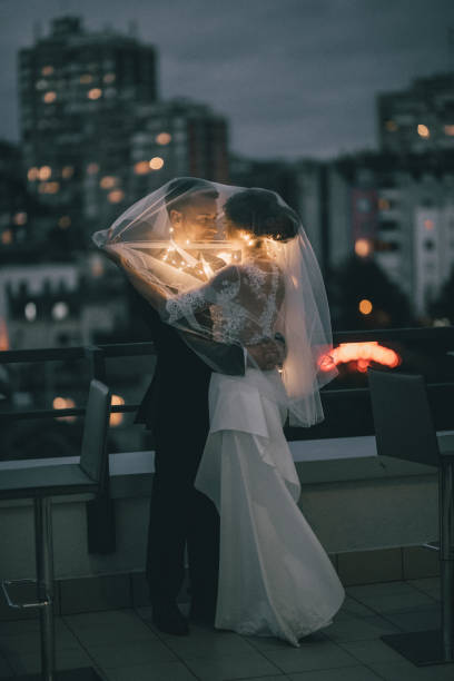 istock Bride and bridgroom and the city view 868939102