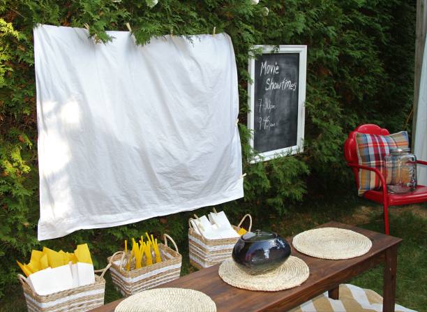 istock Set up for watching a movie outdoors with food and chairs 868944998