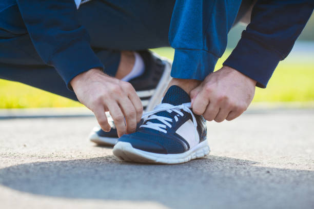 istock Tuning sport shoes before training 868945058
