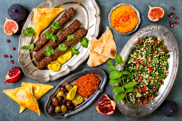 istock Middle Eastern traditional dinner. Authentic arab cuisine. Meze party food. Top view, flat lay, overhead 868945318