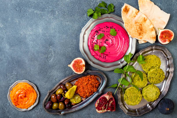 istock Middle Eastern traditional dinner. Authentic arab cuisine. Meze party food. Top view, flat lay, overhead, copy space 868945320