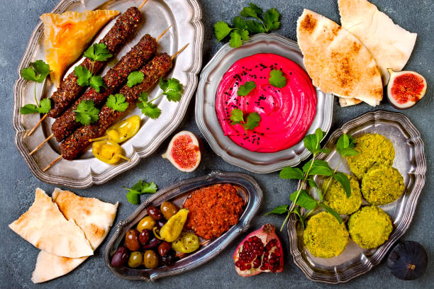 istock Middle Eastern traditional dinner. Authentic arab cuisine. Meze party food. Top view, flat lay, overhead 868945348