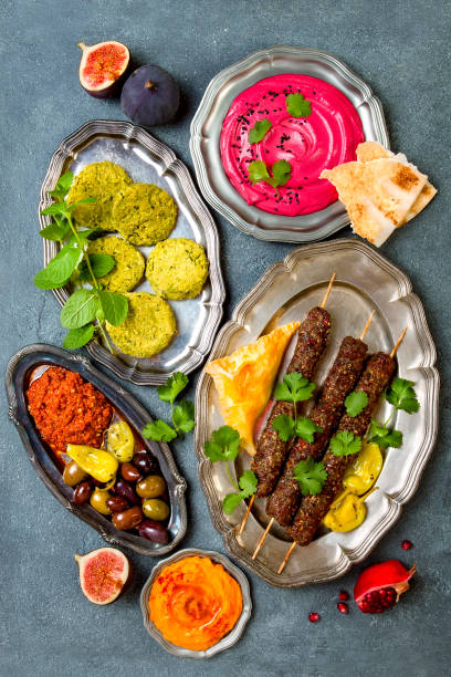 istock Middle Eastern traditional dinner. Authentic arab cuisine. Meze party food. Top view, flat lay, overhead 868945836