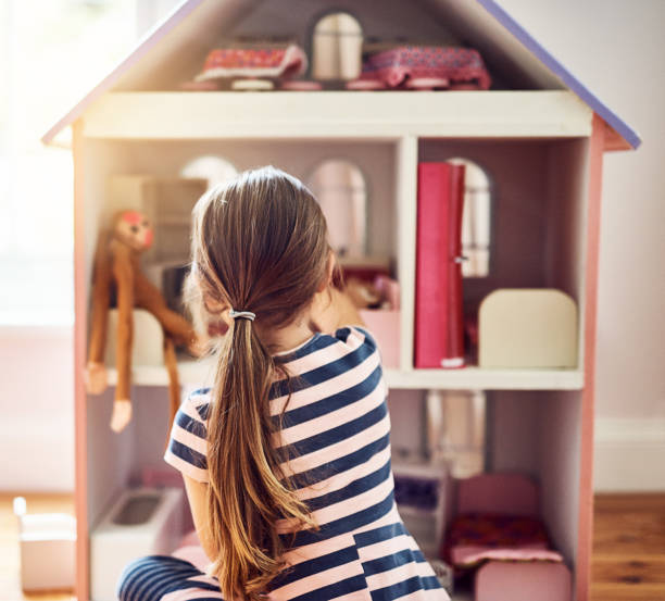 istock She's got big ideas for her dollhouse 868951636