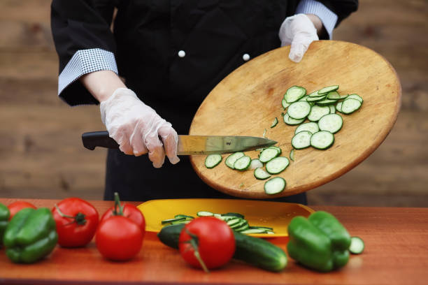 istock The cook cuts fresh farm vegetables 868958870