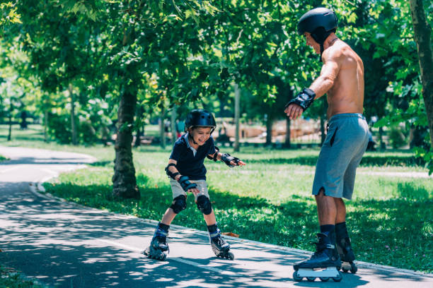 istock Grandfather and grandson spending quality time, roller skating 868963440