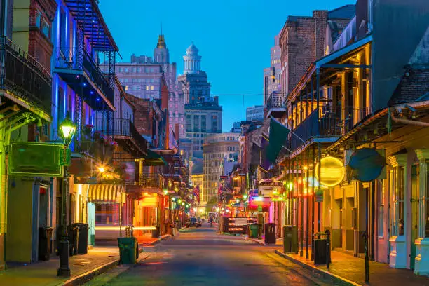 Photo of Pubs and bars with neon lights in the French Quarter, New Orleans