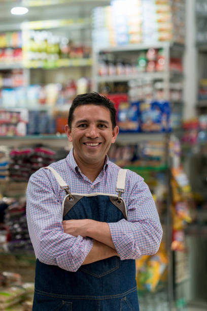 istock Happy manager working at a supermarket 868973122