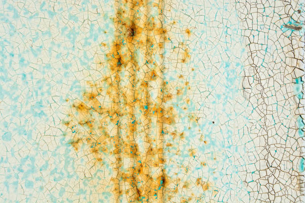 istock Green cracked painting on metal surface 868973132