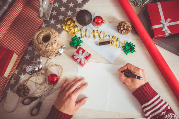 istock Women writing christmas letter 868982488