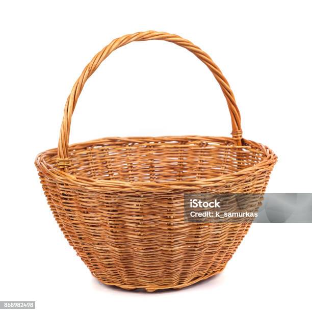 Empty Wicker Basket For Fruits And Vegetables Isolated On White Stock Photo - Download Image Now