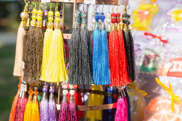 istock Close up colorful ethnic thread earrings for sale 868986312