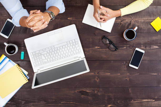 istock Business People Working on an Office Desk 868987634