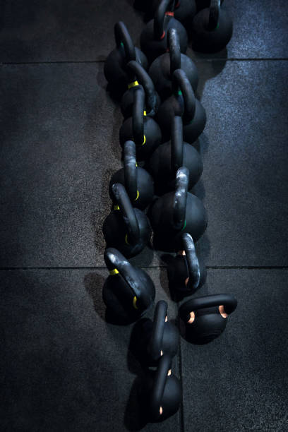 Rows of kettlebells in a gym