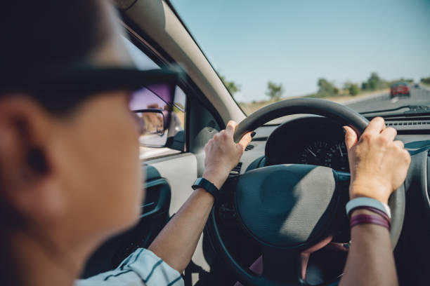 istock Woman driving car 868991496