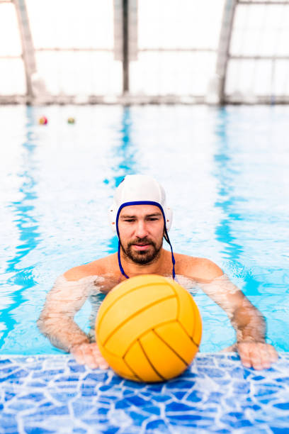 istock Water polo player in a swimming pool. 868991746