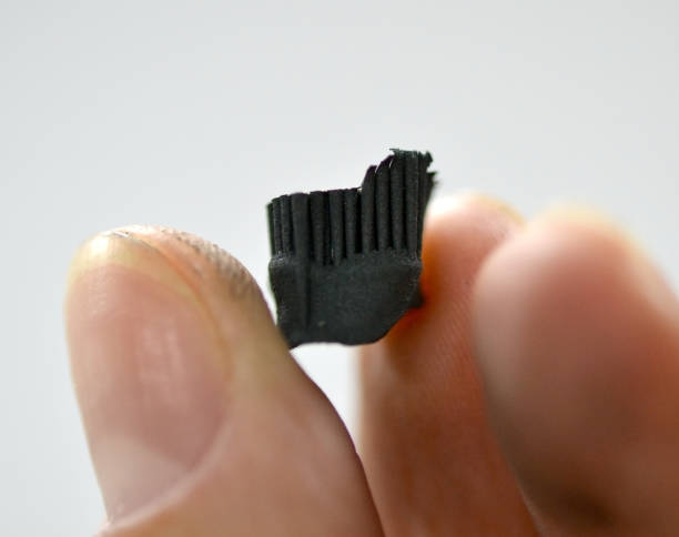 istock A man holds in his hand an object printed on a 3d printer that prints metal 868995772
